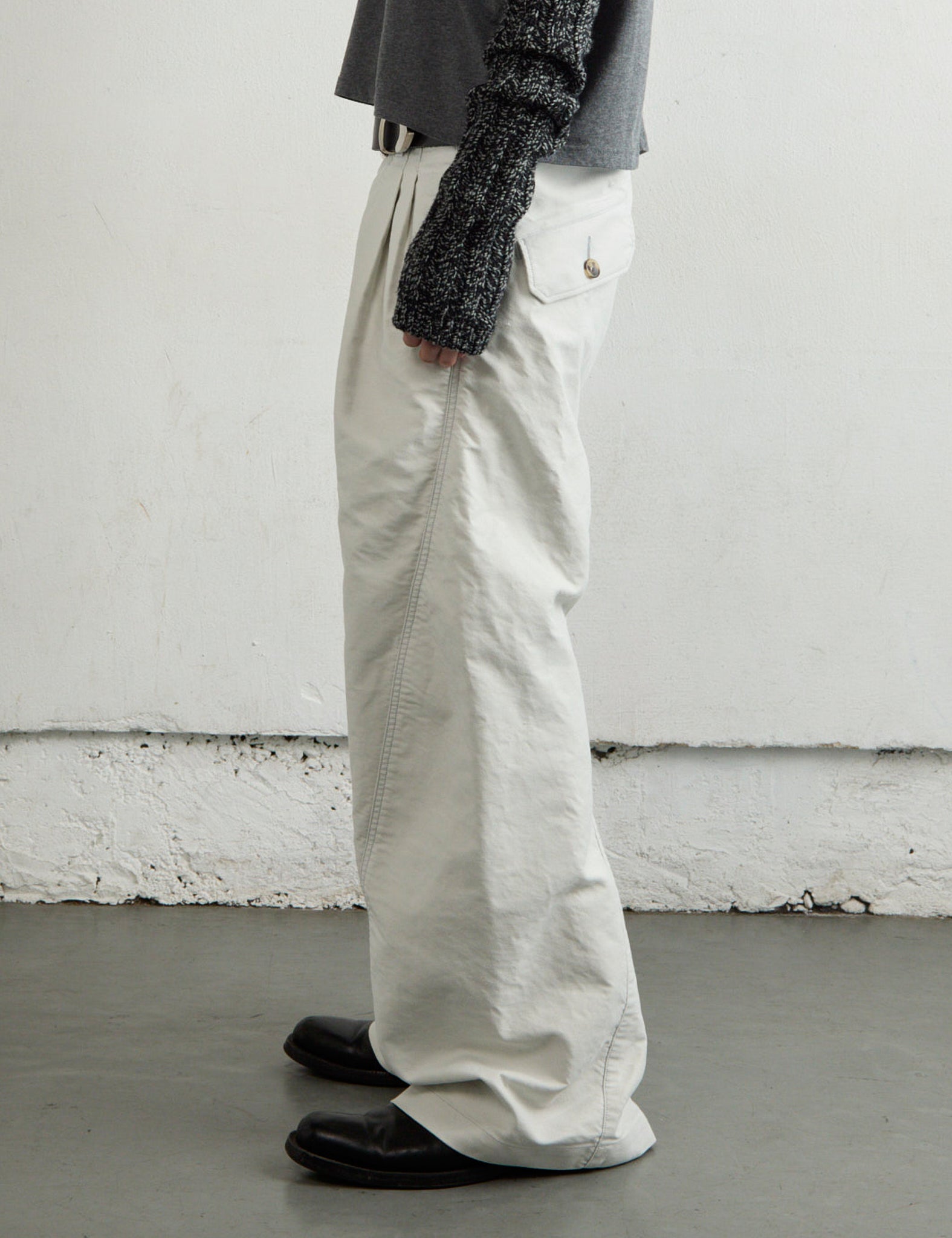 WHITE TUCKED WIDE LEG TROUSERS