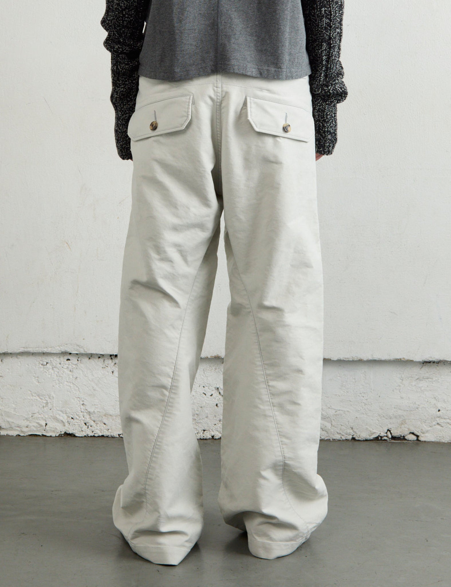 WHITE TUCKED WIDE LEG TROUSERS