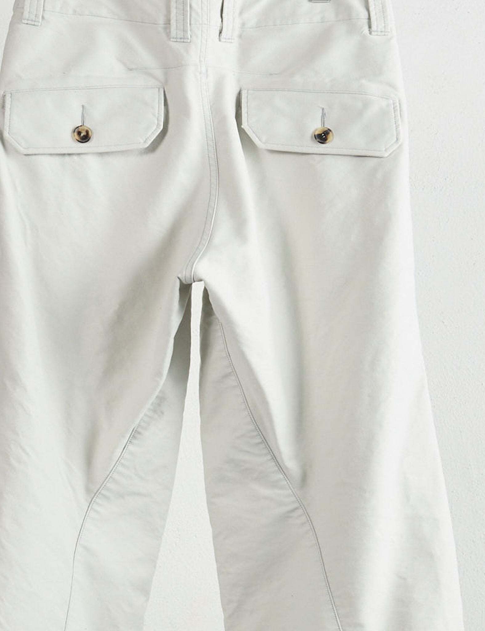 WHITE TUCKED WIDE LEG TROUSERS