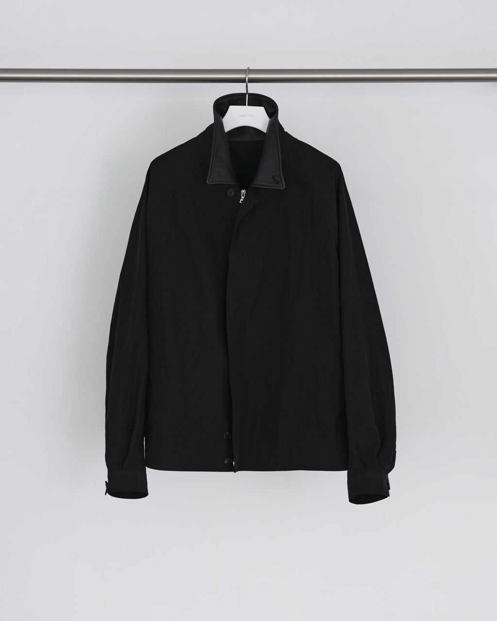 GRAPH LAYER EXCLUSIVE BLACK WINDPROOF NYLON OVERSIZED SHORT JACKET