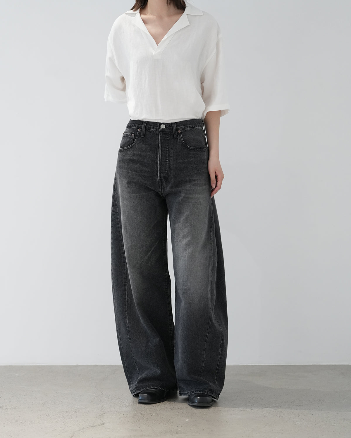BLACK DEFORMATION WIDE DENIM PANTS
