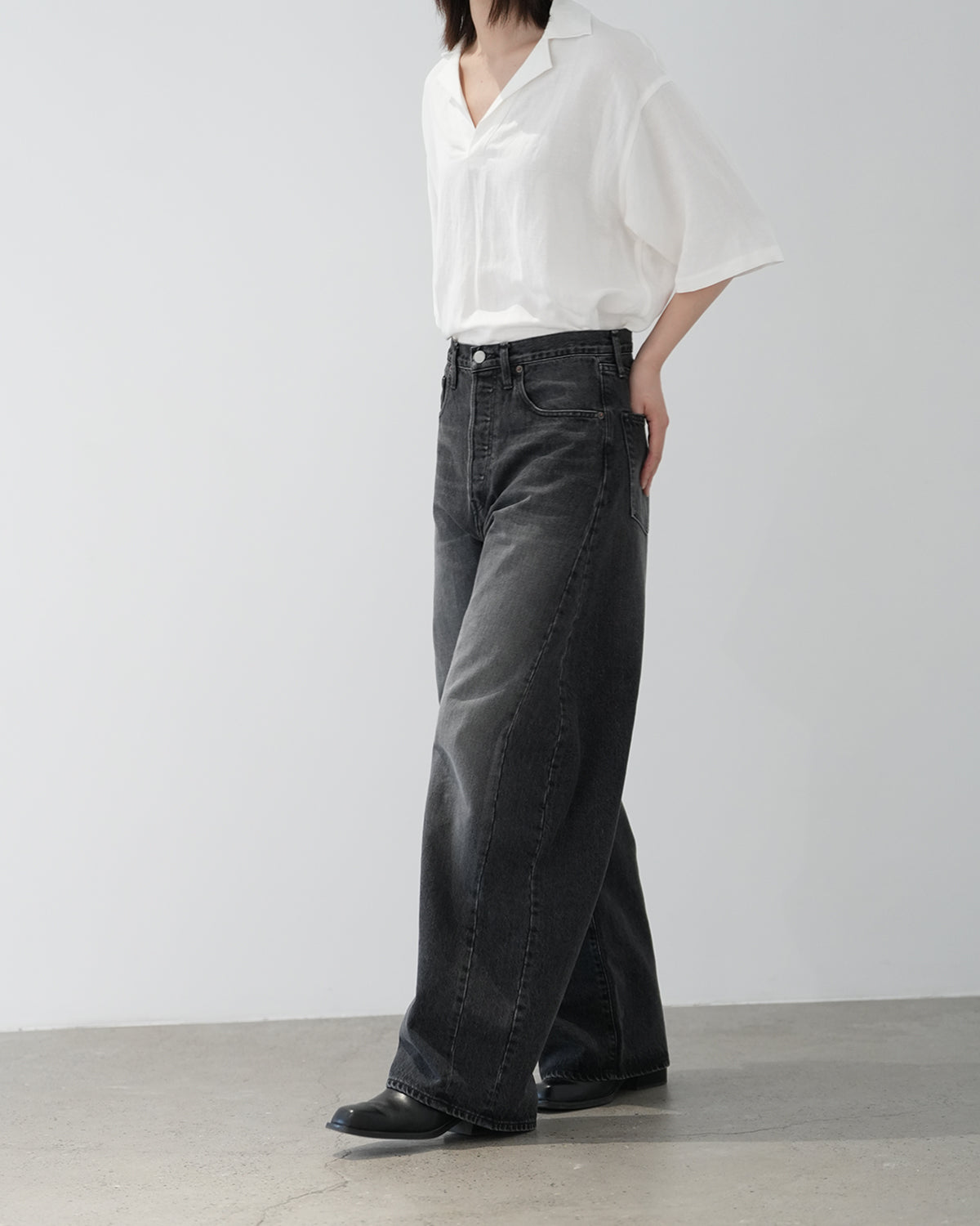 BLACK DEFORMATION WIDE DENIM PANTS