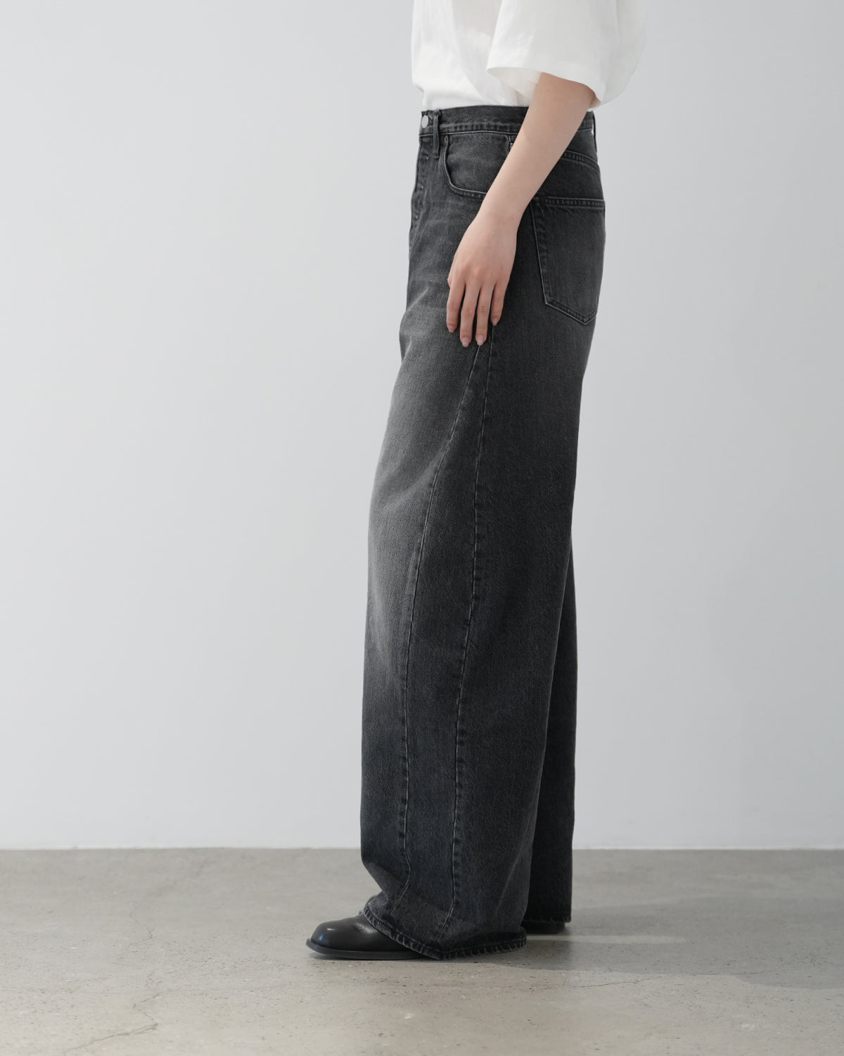 BLACK DEFORMATION WIDE DENIM PANTS