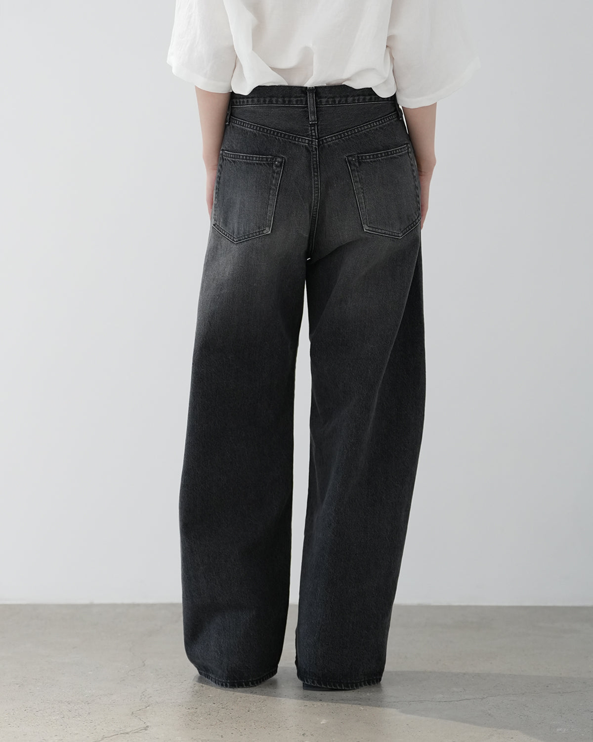 BLACK DEFORMATION WIDE DENIM PANTS
