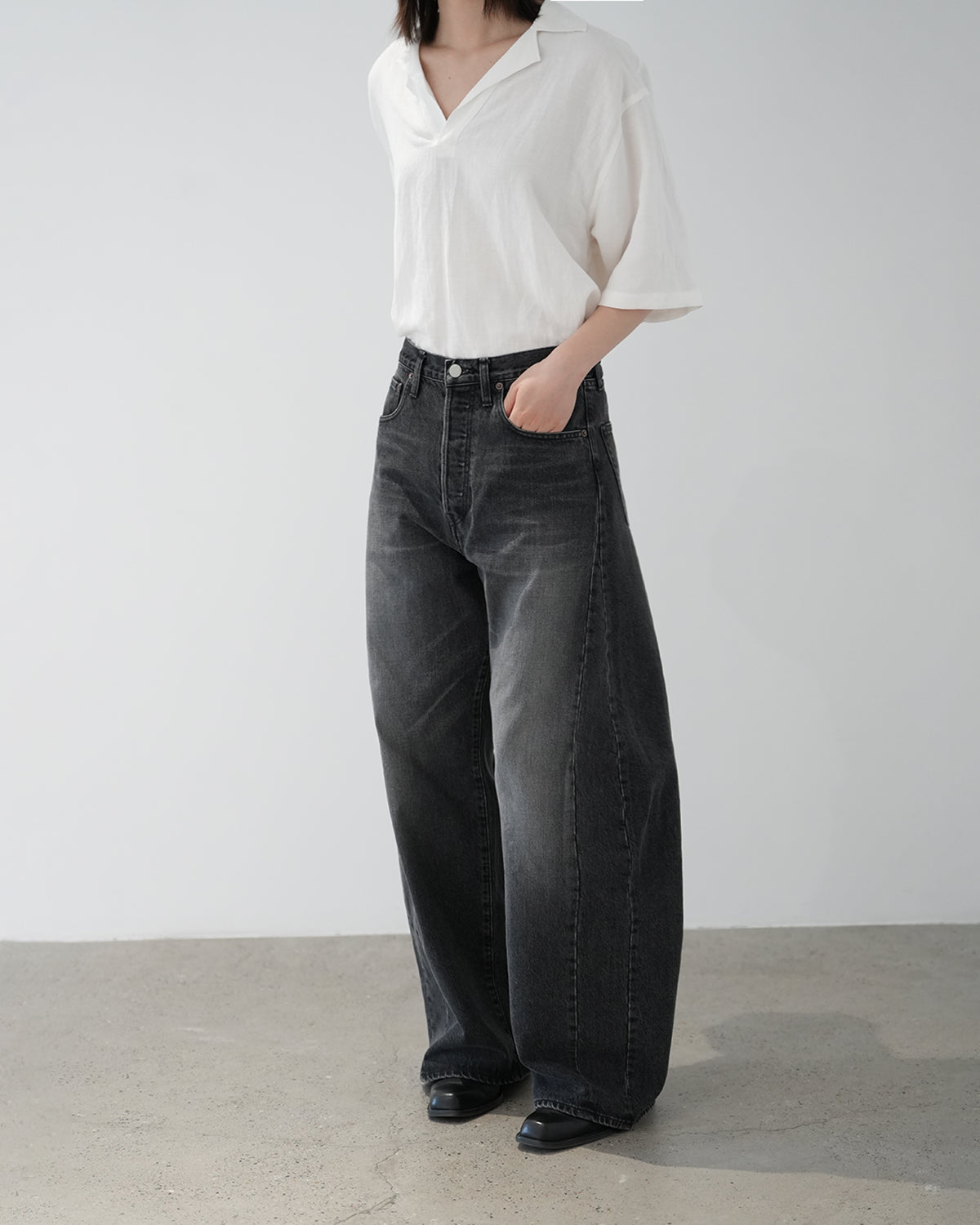 BLACK DEFORMATION WIDE DENIM PANTS