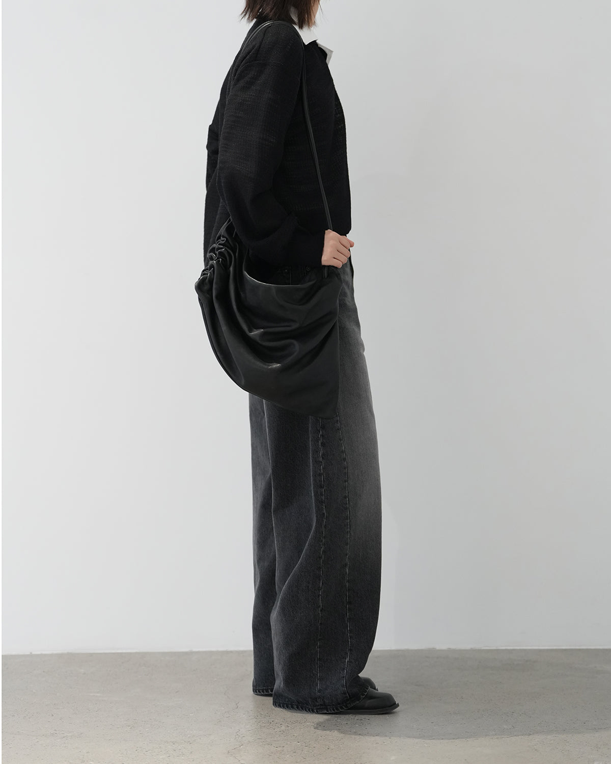 BLACK DEFORMATION WIDE DENIM PANTS