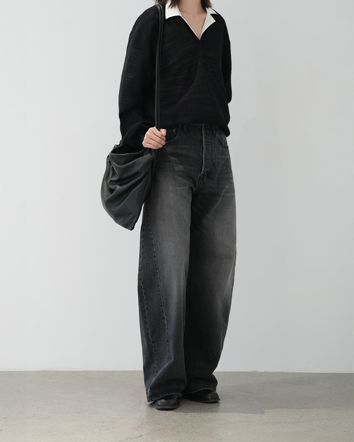 BLACK DEFORMATION WIDE DENIM PANTS