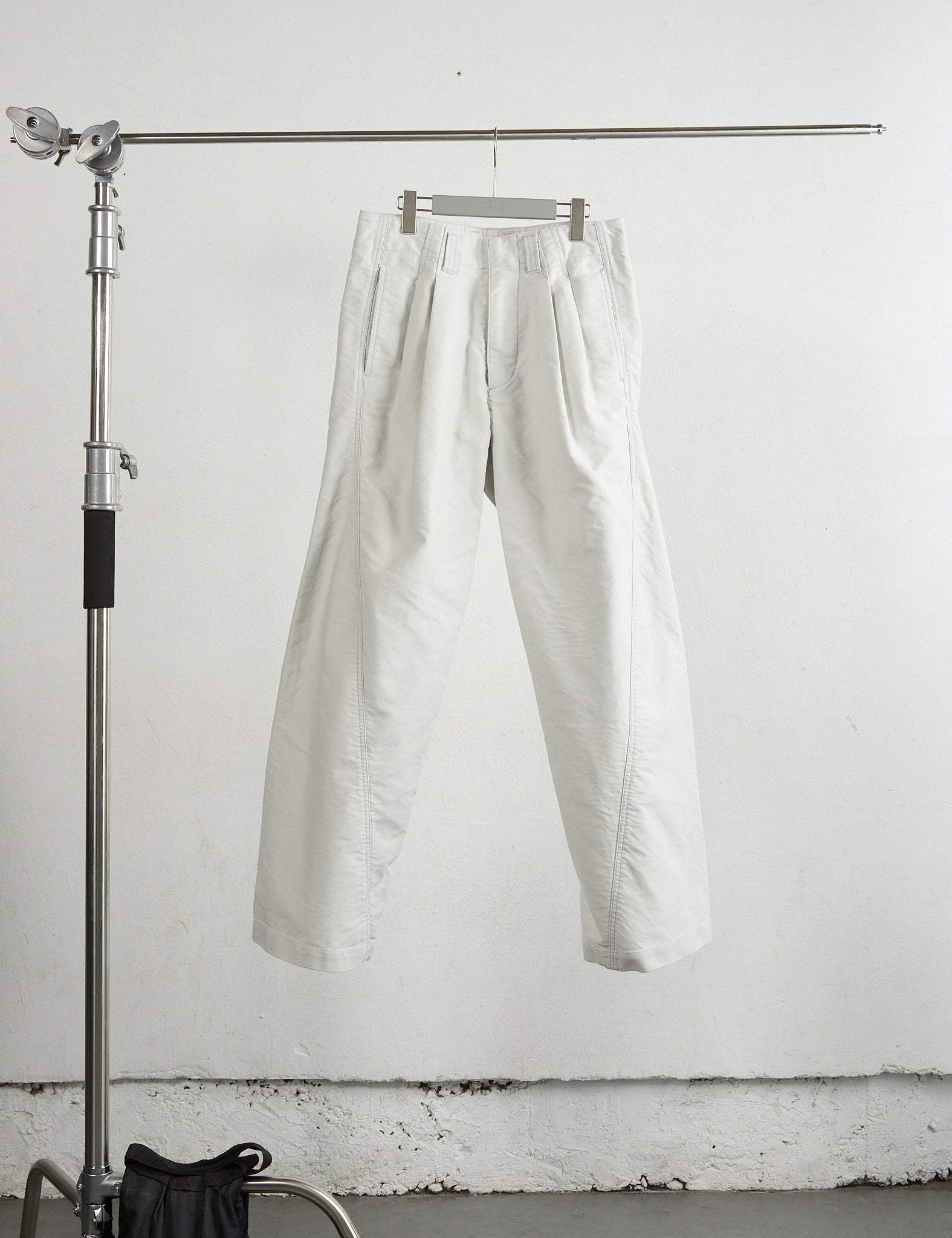 WHITE TUCKED WIDE LEG TROUSERS