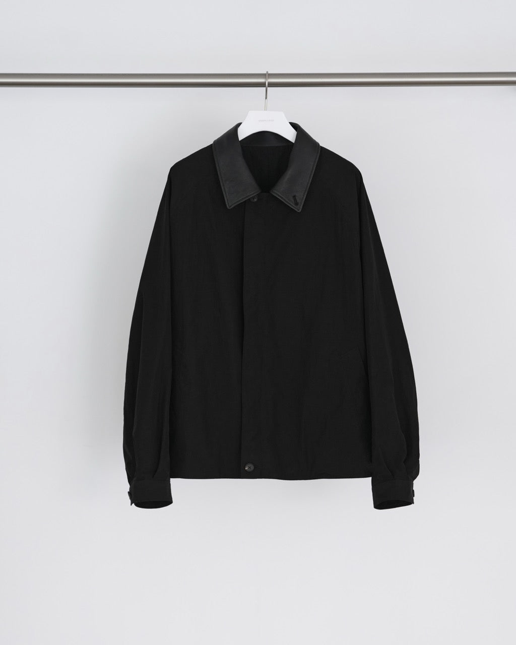 GRAPH LAYER EXCLUSIVE BLACK WINDPROOF NYLON OVERSIZED SHORT JACKET