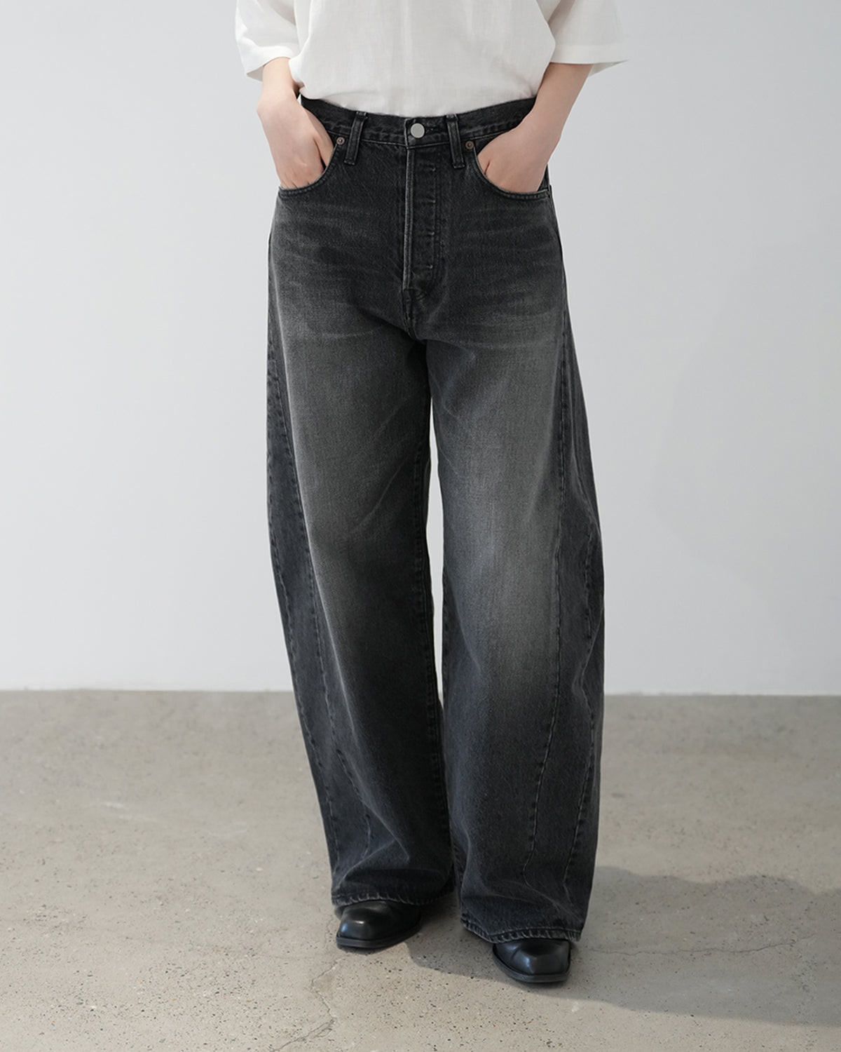 BLACK DEFORMATION WIDE DENIM PANTS